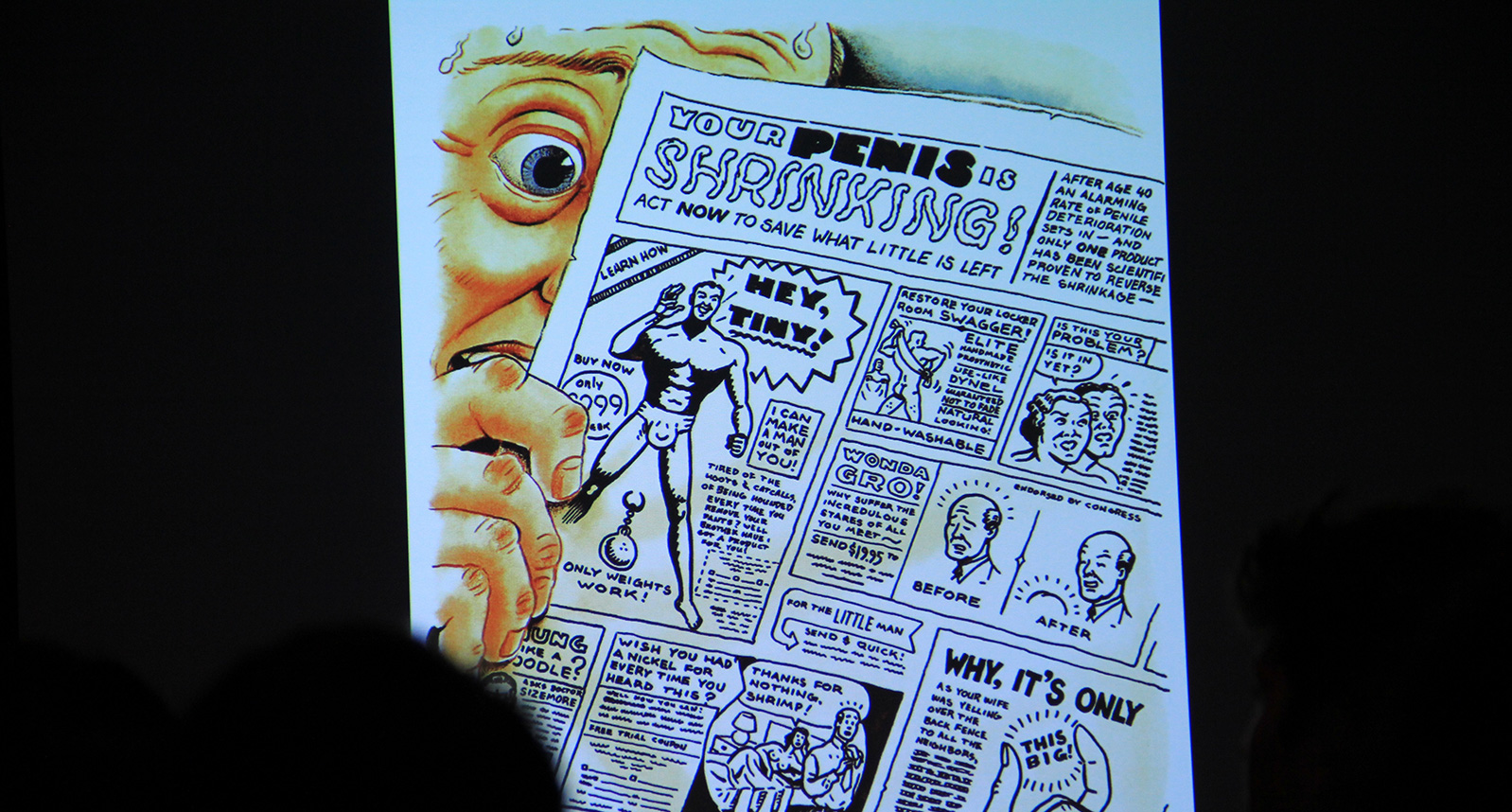 a comic book page with superhero illustrations and storylines is projected onto a wall