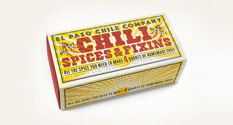 chili spices and fixins box with red writing over a sunny yellow illustration
