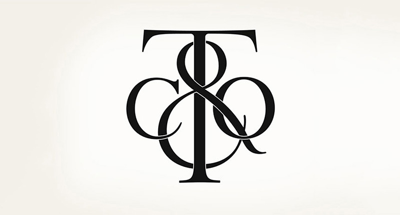 T & CO logo