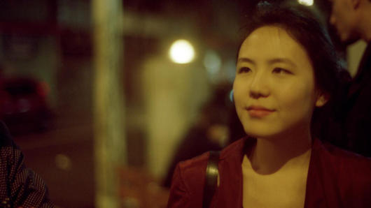Livia Ito in red jacket