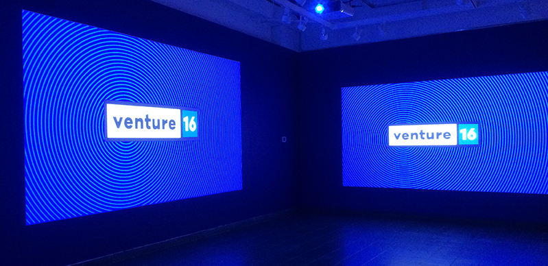 venture 16  exhibition logo projected on two walls