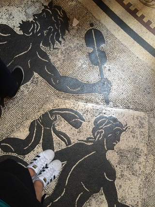 stepping on a figurative floor mosaic