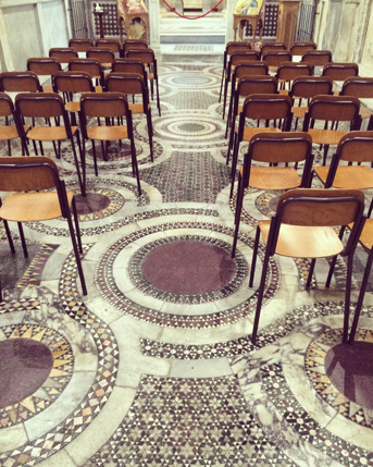 decorative floor with lined up chair