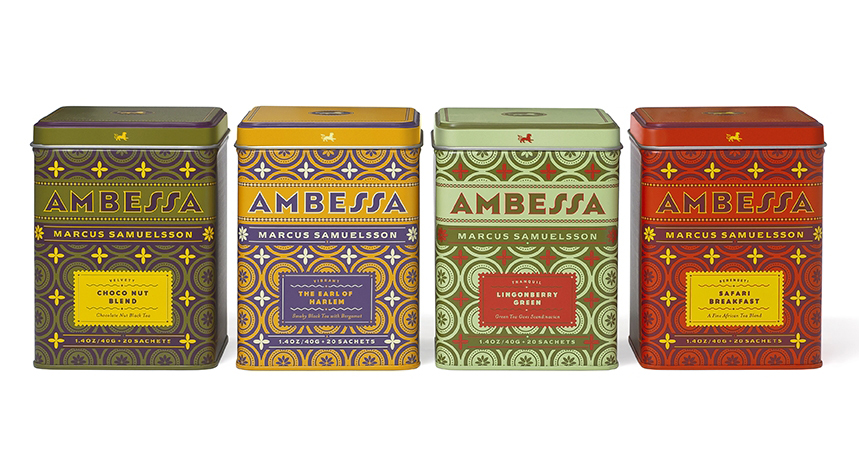 A set of four metal boxes with lids, each having a different color like swamp green, yellow and blue, green and red, red and yellow.  Also on each box there is the text: Ambessa and some other label.