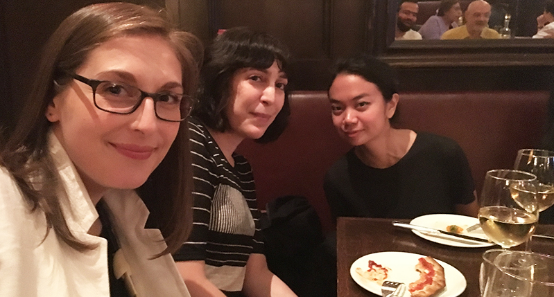photo of three women at a dinner table