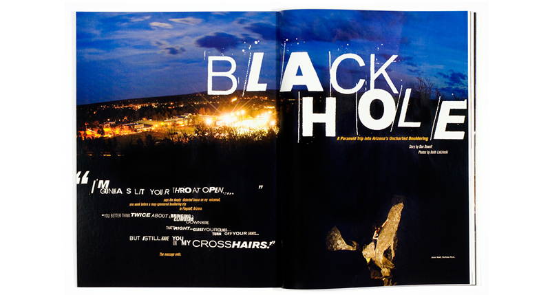 An opened magazine with a photo of a night scape and the white text: Black Hole.