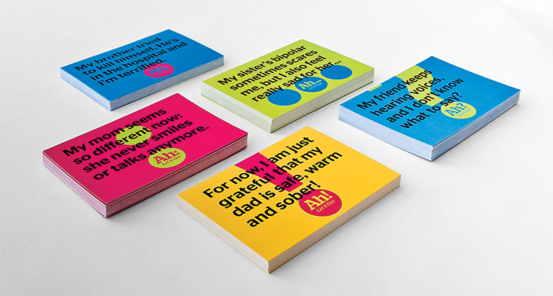 A set of blue, yellow, red and green card designs.