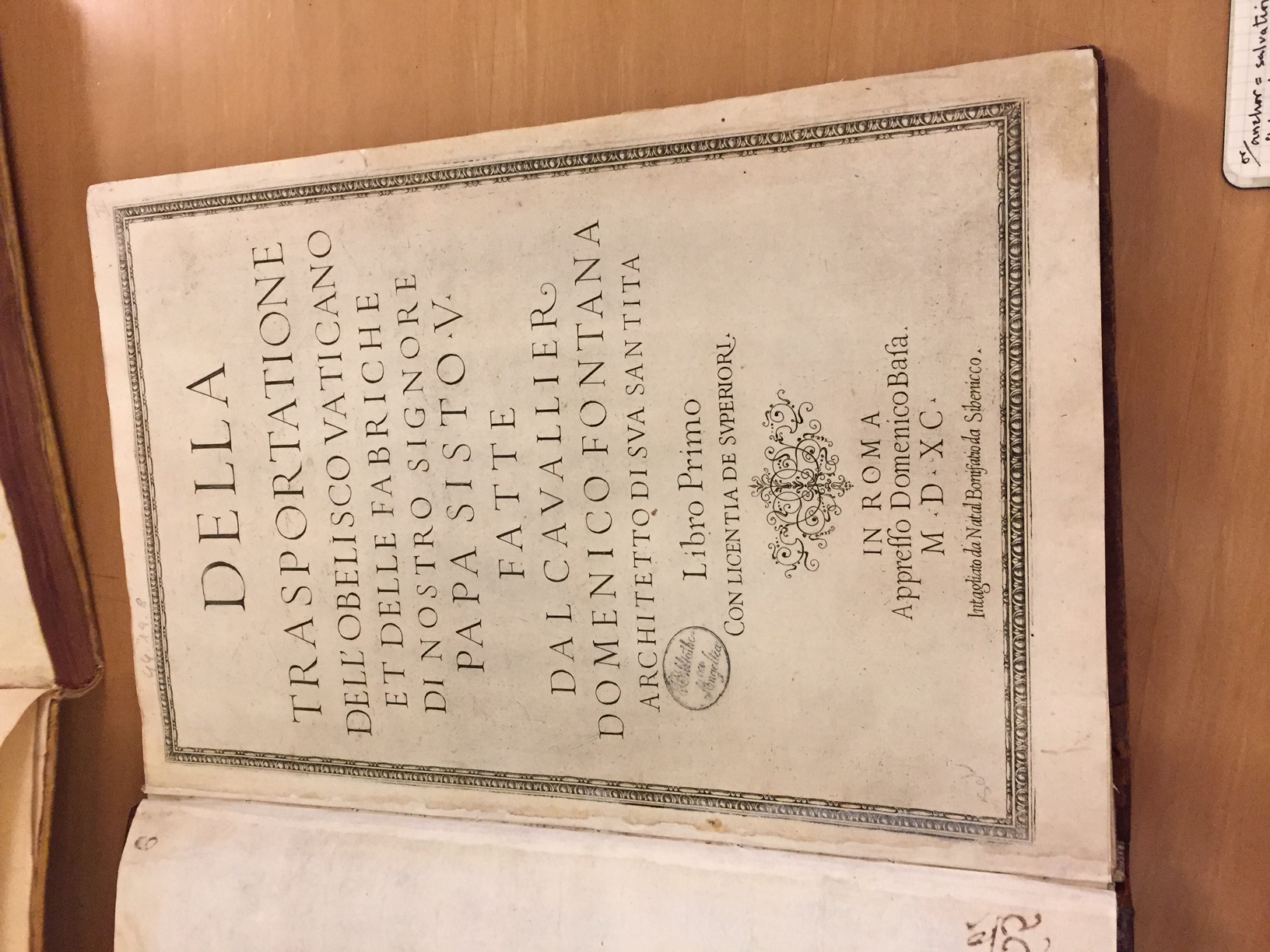 Text written on the cover of an old book.