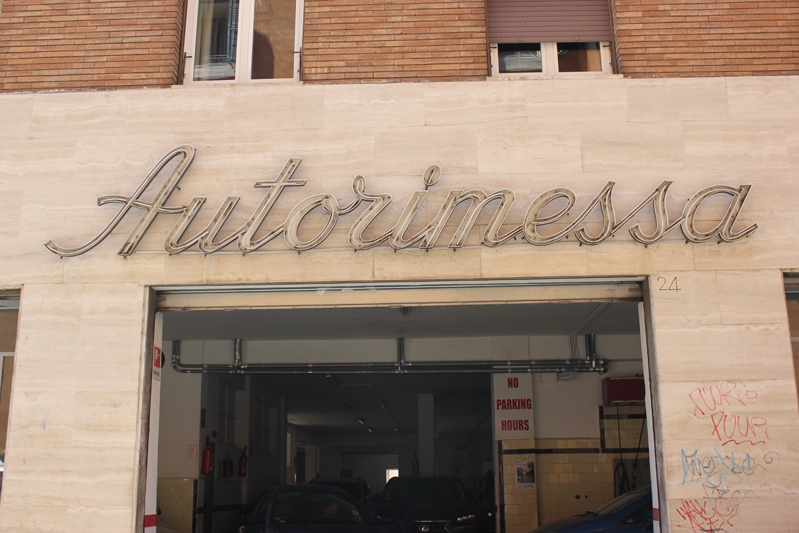 autorimessa shop title made with italic typeface