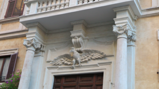 front entrance door decorations with an eagle statue