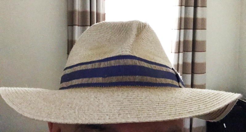 A photo of a white hat.