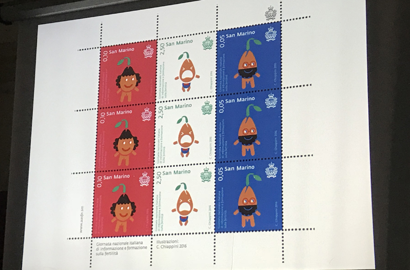 A set of red, white and blue stamps with drawings of personified brown and green plants. They represent a male, a female and a baby in the middle.