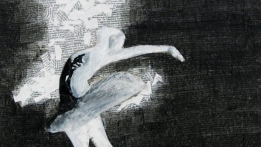 A white drawn ballerina performing in a black room. The wall near her is also illuminated with white shapes
