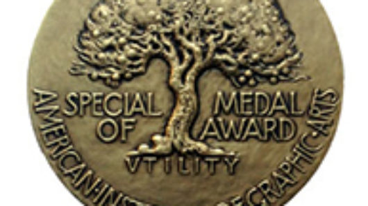 A picture of a medal with an embossed tree on it. The text on the medal: Beauty Special Medal Of Awards. American Institute of Graphic Arts.