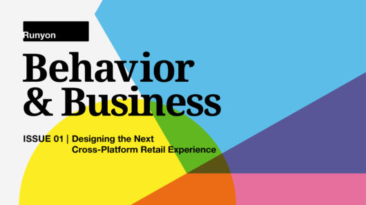 A poster colored with blue, green, yellow, red, olive, pink and indigo shapes. On it there is the black text: Behavior & Business Issue 01. Designing the Next Cross-Platform Retail Experience.