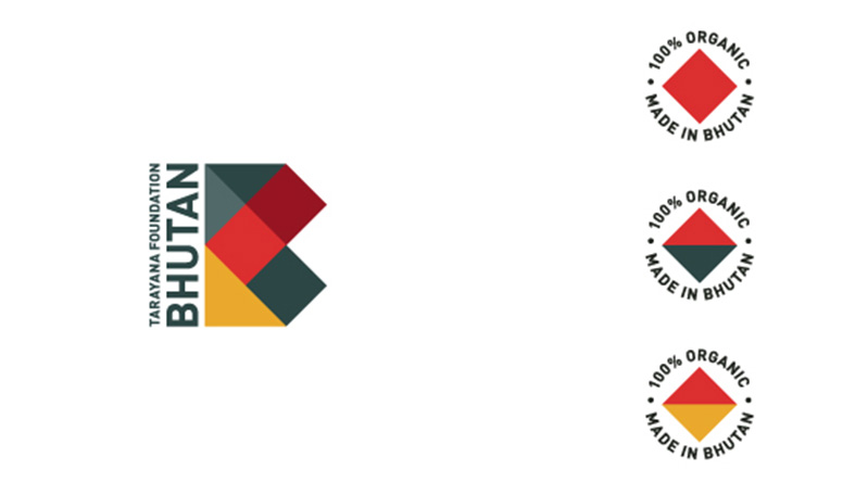 A gray, red and yellow logo made from polygons along with the text Tarayana Foundation Bhutan. Also there are three additional smaller logos with text: 100% Organic Made In Bhutan.