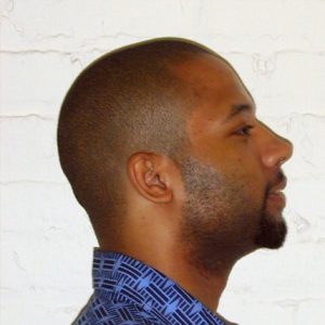 A photo of a man's profile.