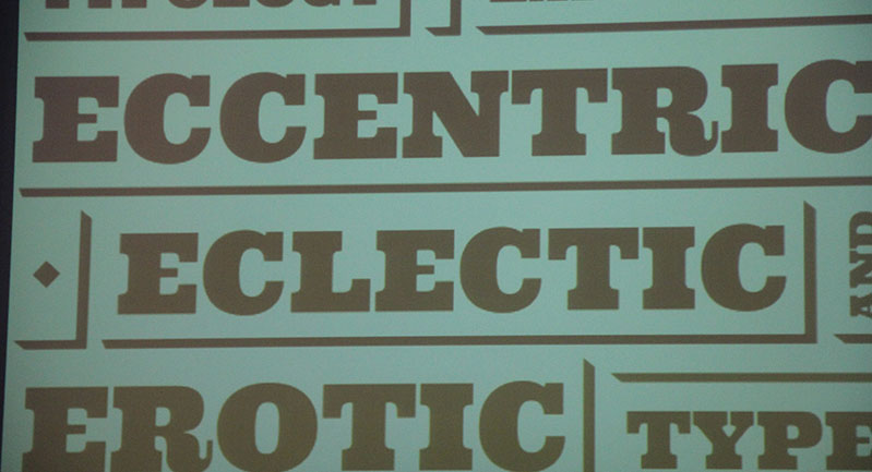 An image of some text written on a cyan background. The text says Eccentric Ecketic Erotic Type.