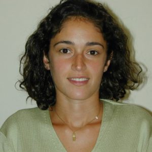 A photo of a woman smiling.