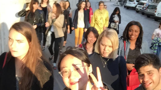 portrait of students on the sidewalk