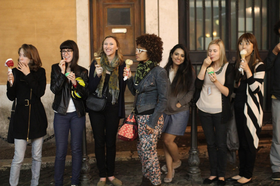 A photo of a group of women enjoying some ice-cream cones.
