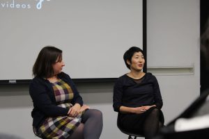 A photo of two women giving a lecture.