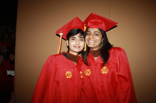 A photo of two freshly grads students from SVA School of Visual Arts.