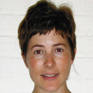 A photo of a woman smiling.