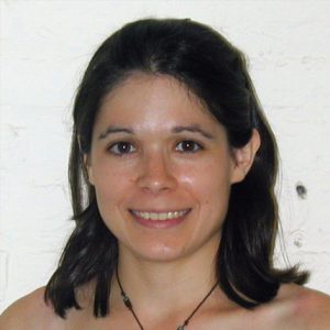 A photo of a woman smiling.