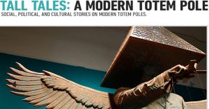 A photo of a totem pole that looks like a winged person with a pyramid on his head and pointing at something. The pyramid is covered in text. On top of the photo there is a title that says: TALL TALES: A MODERN TOTEM POLES. Social, Political and Cultural Stories on Modern Totem Poles.