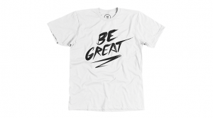 A photo of a white T-shirt with black text: Be Great.
