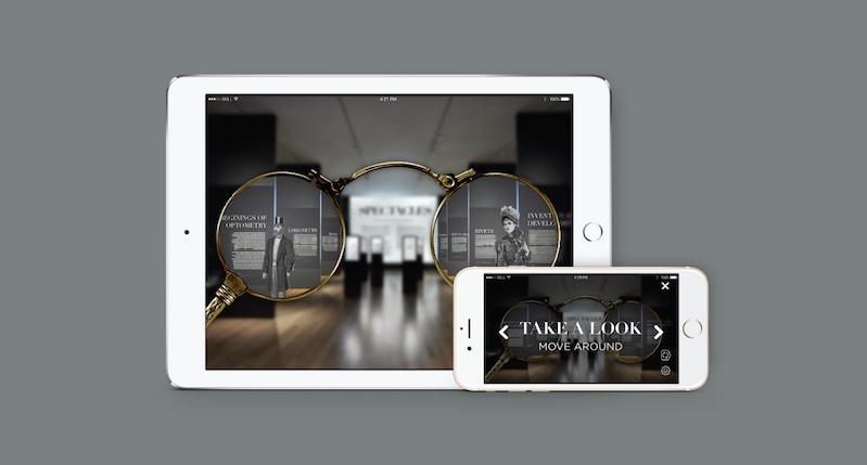 A website design for tablet and phone. The photo on the website represents a pair of glasses which have on the lenses a drawing of a man and a woman wearing early century clothes. The rest of the picture around the glasses continues with the modern day gallery.