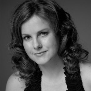 A black and white photo of a woman's space.