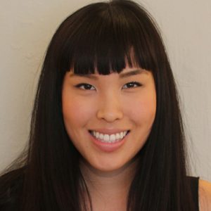 A photo of a woman in a black dress.