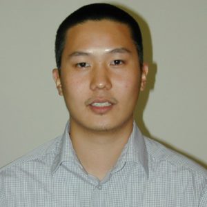 A photo of a man's face.