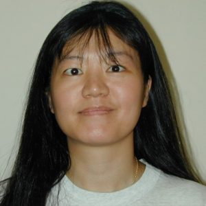 A photo of a woman smiling.