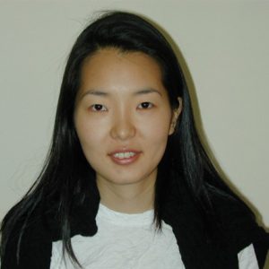 A photo of a woman smiling.