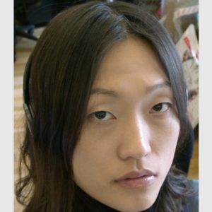 A photo of a woman smiling.