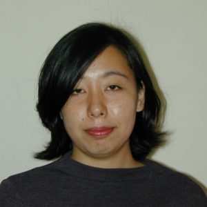 A photo of a woman smiling.