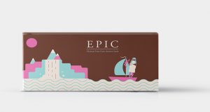 A box with a brown, white, cyan and magenta drawing of a person sailing a boat, while getting closer to a city. The text on the box is: EPIC.