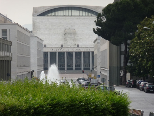 A photo of the entrance to a building with the text: Palazio Del Congressi.