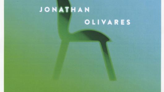 A blue and green gradient poster showing the pictogram of a chair and the name Jonathan Olivares in white.