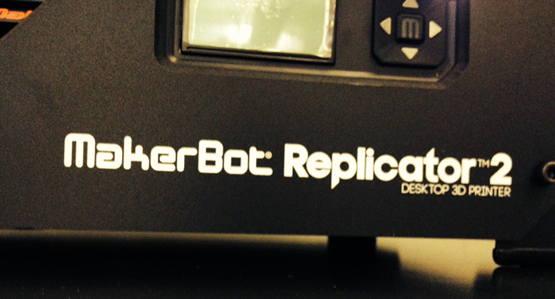 A photo of a desktop 3d printer named Maker Bot Replicator.