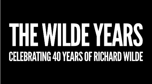 A black banner with a white text that says: The Wilde Years CCelebrating 40 Years Of Richard Wild