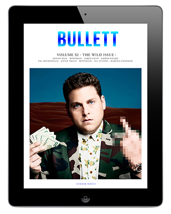 A design of a website on a tablet. The title of the website: BULLETT and a picture of a man holding money in one hand and the other hand is blurred.
