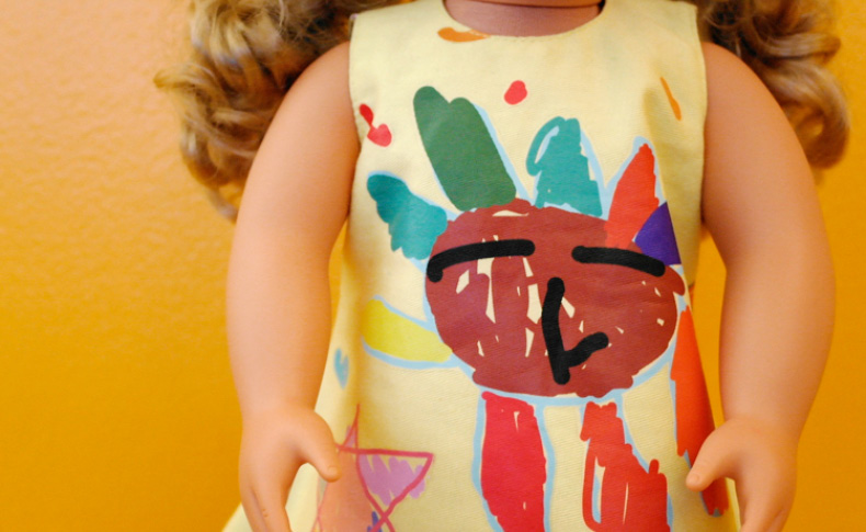 A photo of a dolls colorful dress.