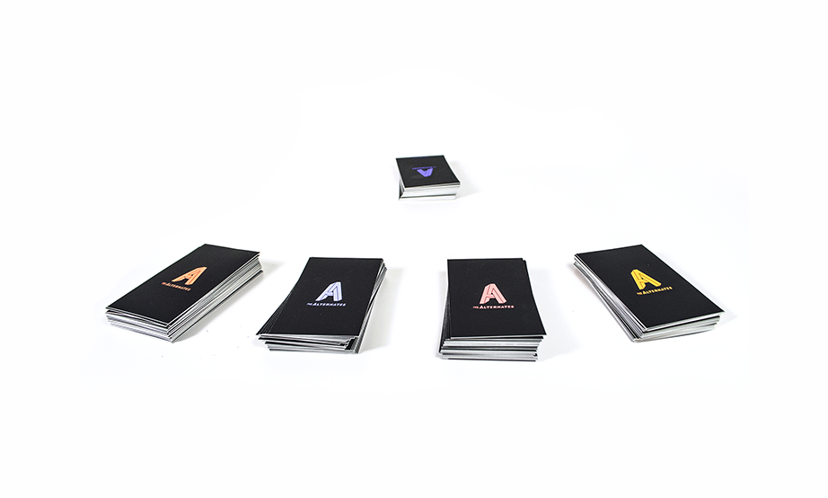 five stacks of black cards with colored A letters on their back