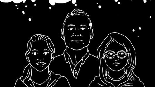An inverted black and white drawing of three people.