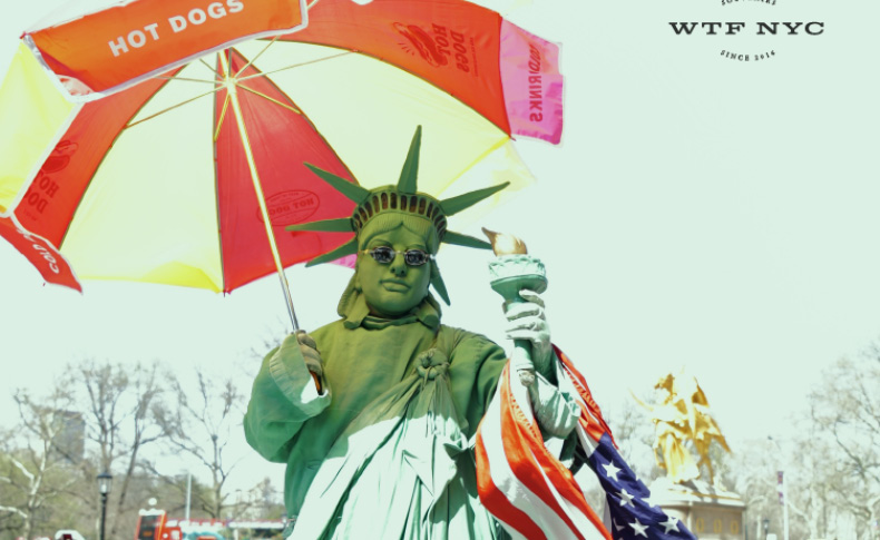 WTF NYC logo on an image with a custom liberty statue with a hotdog umbrella