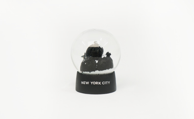 a crystal ball wit the title new york city